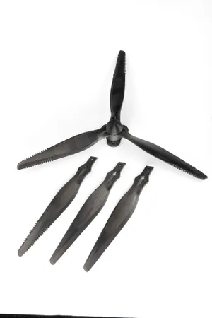 Drone propeller with carbon fibre reinforced composite rotor blades manufactured using tape-sandwich injection moulding technology